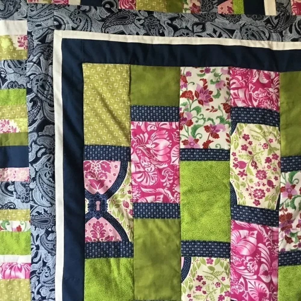 Handmade Quilt 46” x 77”
